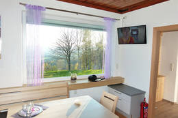 Dining and living room in the holiday house Winter