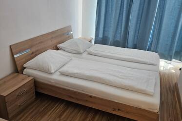 Doppelbett im Aapartment Hofacker in Pernegg an der Mur Doppelbett im Aapartment Hofacker in Pernegg an der Mur